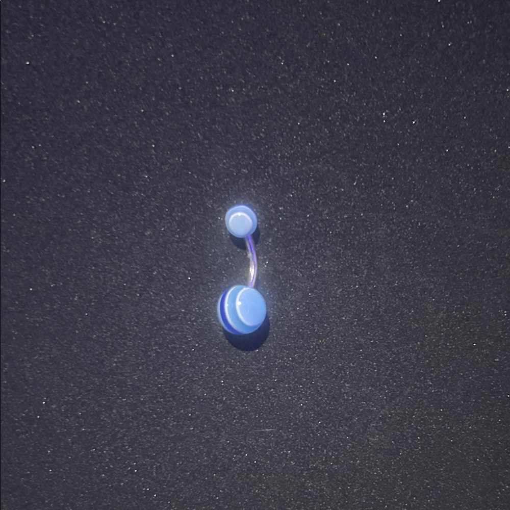 Blue striped navel peircing